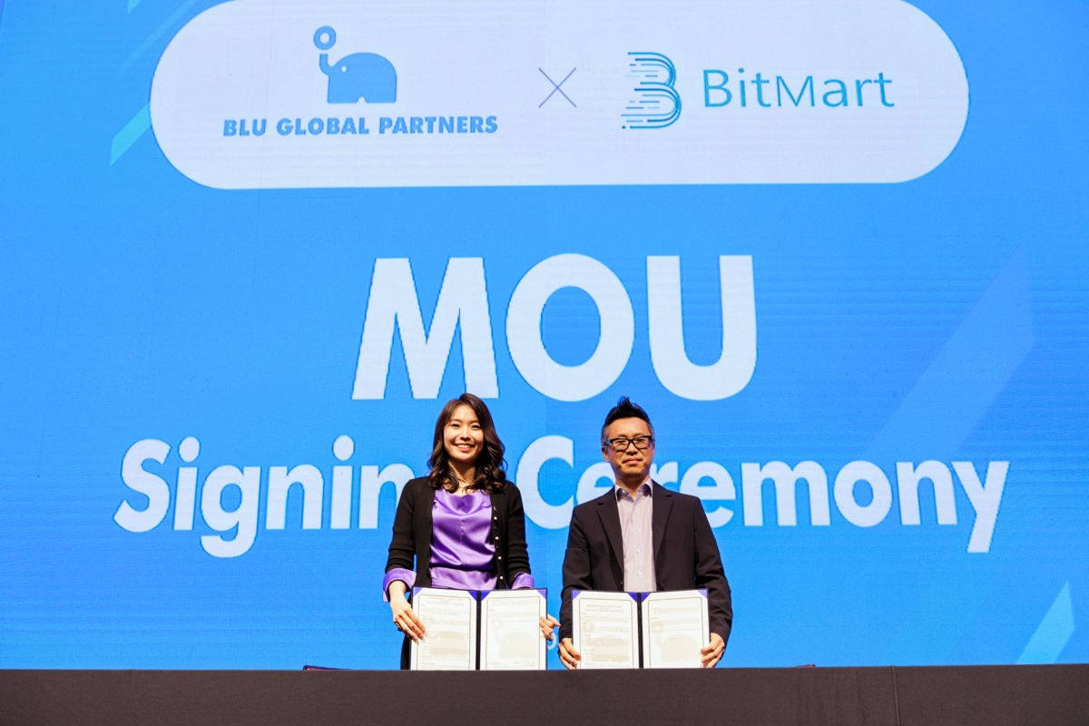 Blucon CEO Sabrina Kim and BitMart CBO Peter King attended the strategic cooperation signing ceremony