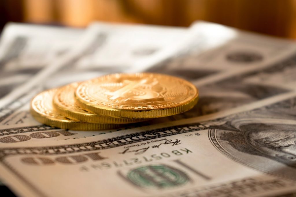 Bitcoin in dollars out: Fed stimulus shows who wants what